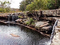 Water falling from a few points round the ledges