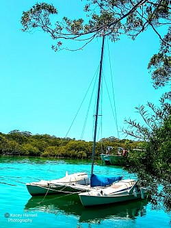 Boat sitting in the clear calm water