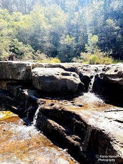 The water trickling from ledge to ledge