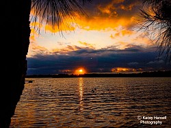 Sunset spot piercing through the dark clouds