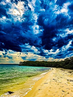 At the beach as the dark clouds move in